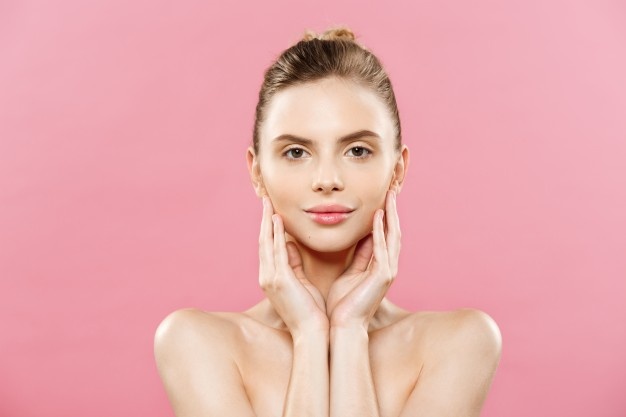beauty-concept-beautiful-caucasian-woman-with-clean-skin-natural-make-up-isolated-bright-pink-background-with-copy-space_1258-1031